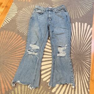 Light Blue Distressed Women's Jeans - Flare Ripped Style